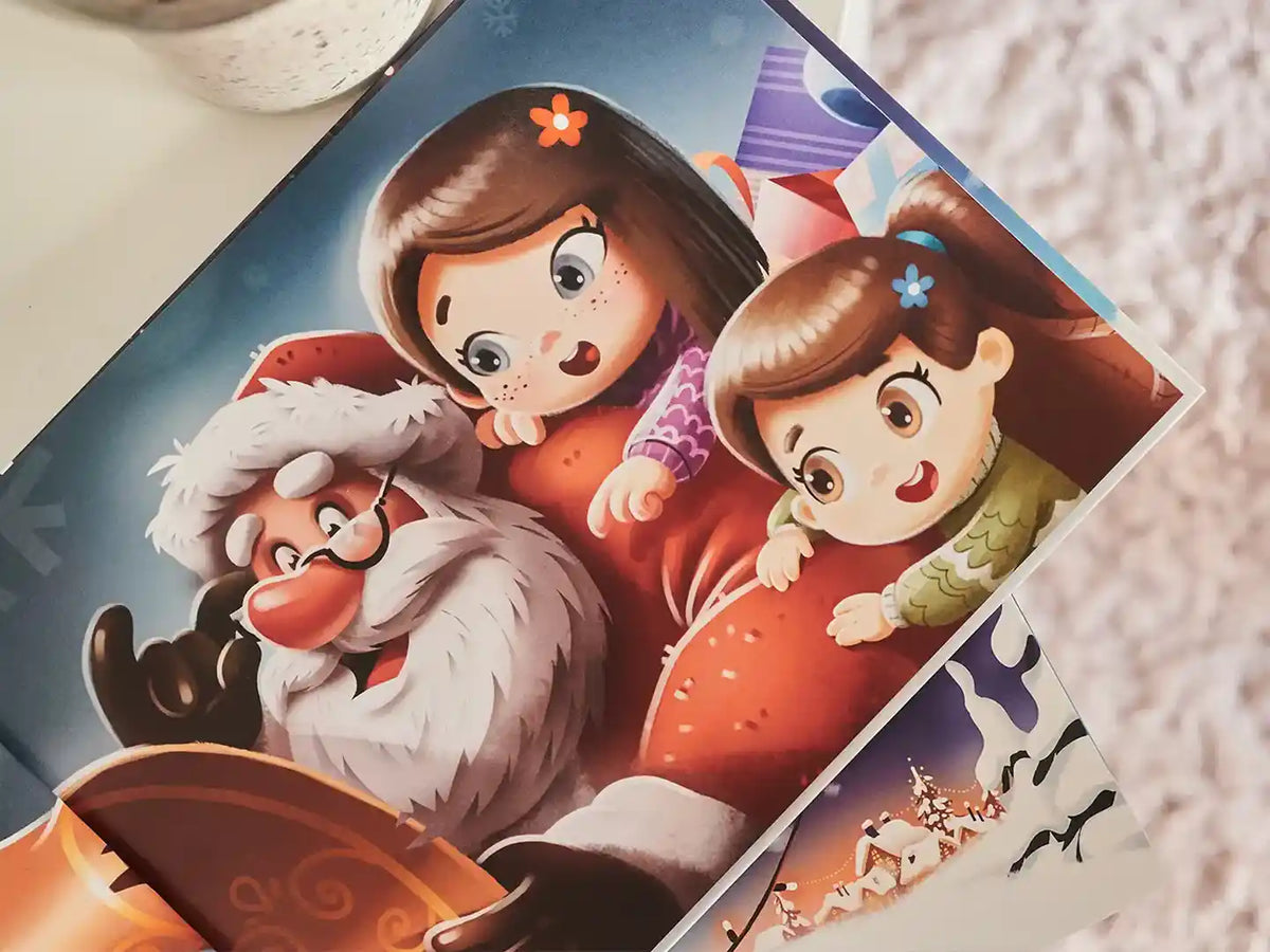 Illustration du livre de Noël avec le Père Noël et vos deux enfants. Un cadeau unique !