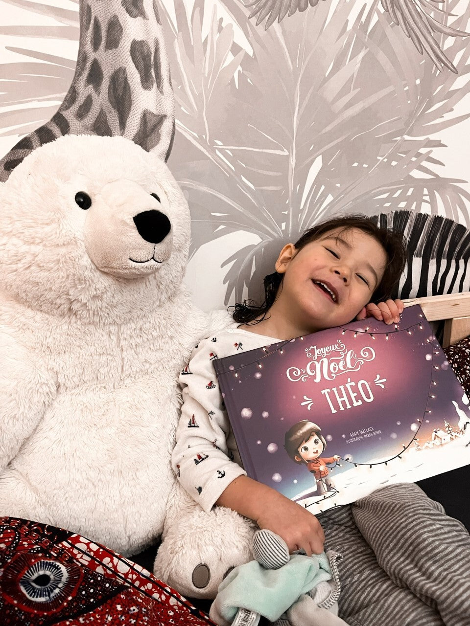 Cadeau idéal pour un enfant : un livre personnalisé de Noël.