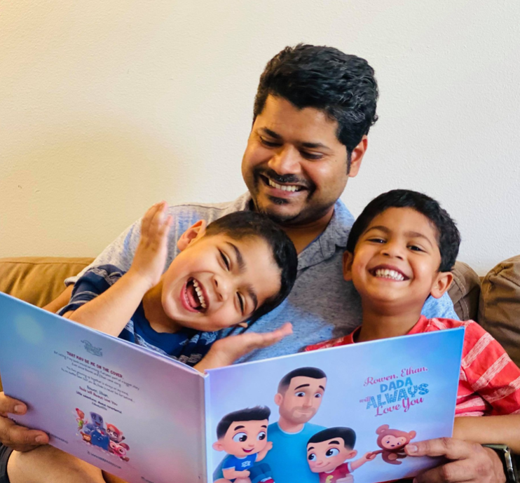 Une famille avec son livre pour Papa + 2 enfants par Hourra Héros.